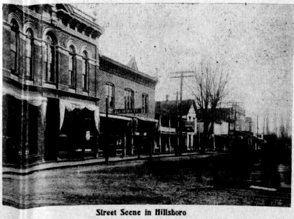 Photo of a street, with caption: "street scene in Hillsboro"